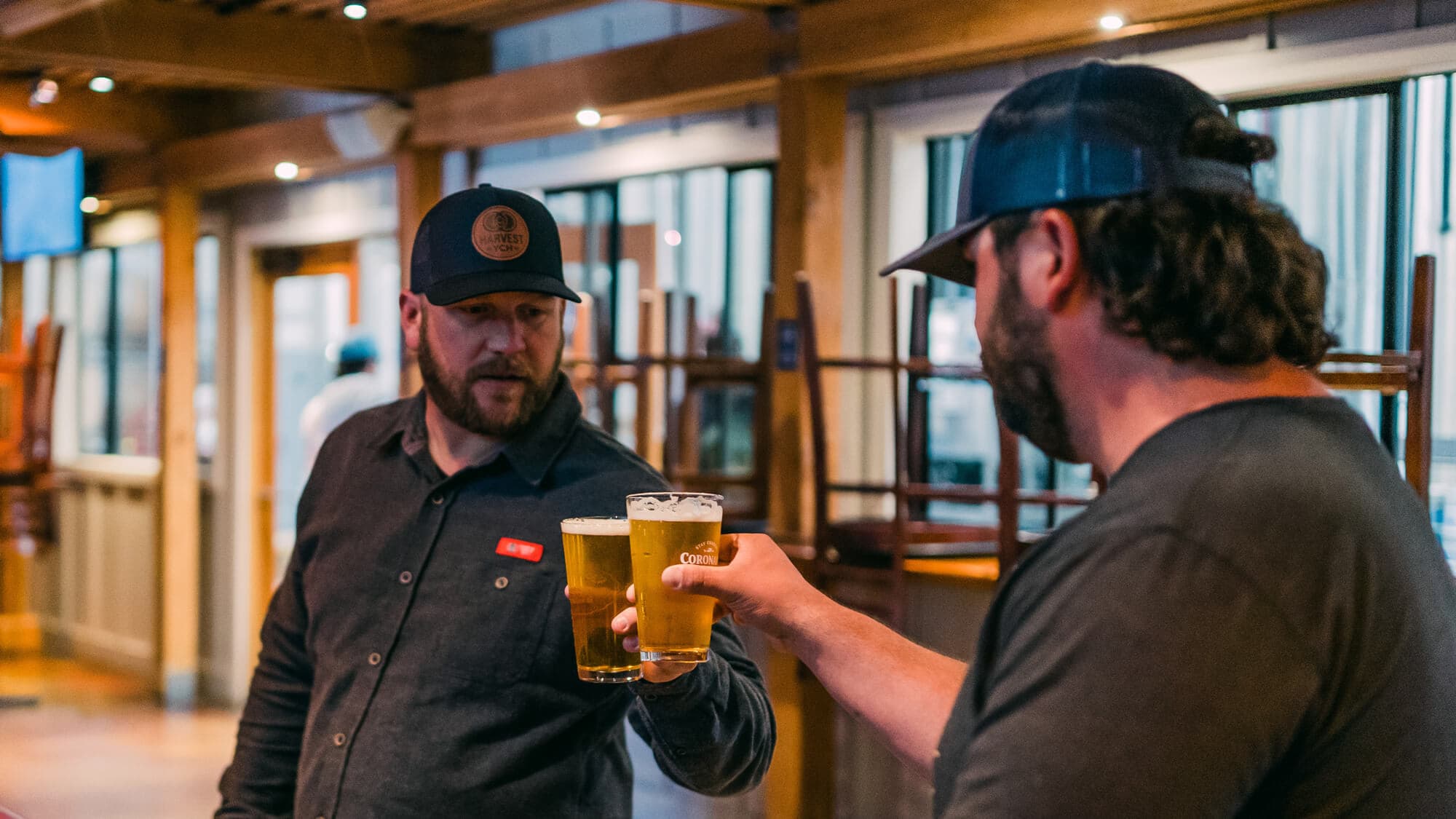 Two hop growers cheersing